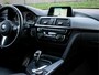 BMW 3-Serie Touring 320i M-sport edition Shadow line | Adaptive cruise | Navi | PDC | Climate control | Dodehoek | Leder | Dealer onderhouden