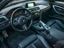 BMW 3-Serie Touring 320i M-sport edition Shadow line | Adaptive cruise | Navi | PDC | Climate control | Dodehoek | Leder | Dealer onderhouden
