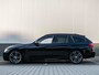 BMW 3-Serie Touring 320i M-sport edition Shadow line | Adaptive cruise | Navi | PDC | Climate control | Dodehoek | Leder | Dealer onderhouden