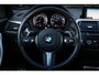 BMW 1-Serie M140i xDrive LCI2 *Schuifdak*H/K*Navi Pro*1e eigenaar*