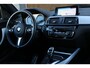 BMW 1-Serie M140i xDrive LCI2 *Schuifdak*H/K*Navi Pro*1e eigenaar*