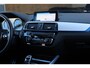 BMW 1-Serie M140i xDrive LCI2 *Schuifdak*H/K*Navi Pro*1e eigenaar*