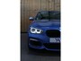 BMW 1-Serie M140i xDrive LCI2 *Schuifdak*H/K*Navi Pro*1e eigenaar*