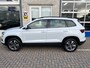 Skoda Karoq 1.0 TSI Ambition / ELEKTR. TREKHAAK/ KEYLESS/ SMARTLINK/ PARK. SENSOREN + CAMERA/ NAVI/ SPRAAKBEDIENING/ CLIMA/ STOEL-STUUR VERWARM.