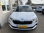 Skoda Karoq 1.0 TSI Ambition / ELEKTR. TREKHAAK/ KEYLESS/ SMARTLINK/ PARK. SENSOREN + CAMERA/ NAVI/ SPRAAKBEDIENING/ CLIMA/ STOEL-STUUR VERWARM.