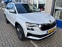 Skoda Karoq 1.0 TSI Ambition / ELEKTR. TREKHAAK/ KEYLESS/ SMARTLINK/ PARK. SENSOREN + CAMERA/ NAVI/ SPRAAKBEDIENING/ CLIMA/ STOEL-STUUR VERWARM.