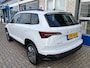 Skoda Karoq 1.0 TSI Ambition / ELEKTR. TREKHAAK/ KEYLESS/ SMARTLINK/ PARK. SENSOREN + CAMERA/ NAVI/ SPRAAKBEDIENING/ CLIMA/ STOEL-STUUR VERWARM.