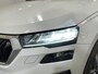 Skoda Karoq 1.0 TSI Ambition / ELEKTR. TREKHAAK/ KEYLESS/ SMARTLINK/ PARK. SENSOREN + CAMERA/ NAVI/ SPRAAKBEDIENING/ CLIMA/ STOEL-STUUR VERWARM.