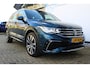 Volkswagen Tiguan 1.4 TSI eHybrid R-Line Business+ | Incl. 12 maanden Garantie | Panorama dak | Memory stand stoelen | Trekhaak wegklapbaar | Stoel & Stuurverwarming | 360* Camera | Climate controle | Adaptive cruise | Elektrische kofferbakklep | Dodehoek detectie | IQ. Lights | Keyless entry/start | Lederen bekleding | Virtual cockpit | Draadloze telefoonlader |