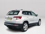 Skoda Karoq 1.0 TSI Ambition Business Aut. | Stoelverwarming | Navigatie | Parkeersensoren | Extra getint glas