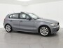 BMW 1-Serie 120i 150 PK 5-DEURS + SCHUIF/KANTELDAK | SPORTSTOELEN | XENON | NAVIGATIE