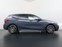 BMW 1-Serie 118i Executive Edition M Sport | M SPORT | HARMAN & KARDON | ELEKTRISCHE ACHTERKLEP | CAMERA | ADAPTIVE CRUISE CONTROL | STOEL- & STUURVERWARMING | HEAD-UP | 19 INCH | INDIVIDUAL KLEUR STORM BAY METALLIC BOMVOL OPTIES