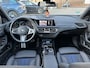 BMW 1-Serie 118i Executive Edition M SPORT | HARMAN & KARDON | ELEKTRISCHE ACHTERKLEP | CAMERA | ADAPTIVE CRUISE CONTROL | STOEL- & STUURVERWARMING | HEAD-UP | 19 INCH | INDIVIDUAL KLEUR STORM BAY METALLIC BOMVOL OPTIES