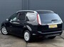 Ford Focus Wagon 1.8 Limited Flexi Fuel - ECC - NAVI - CRUISE CONTROLE - BLUETOOTH - VERWARMDE VOORRUIT - PDC - LM VELGEN - GETINT GLAS - NAP - NL AUTO - APK T/M 05-05-2026 -