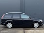 Ford Focus Wagon 1.8 Limited Flexi Fuel - ECC - NAVI - CRUISE CONTROLE - BLUETOOTH - VERWARMDE VOORRUIT - PDC - LM VELGEN - GETINT GLAS - NAP - NL AUTO - APK T/M 05-05-2026 -