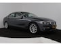 BMW 3-Serie 318i Luxury Edition (DEALER ONDERHOUDEN, PARKEERSENSOREN, NAVIGATIE, AUTOMAAT, CRUISE CONTROL)