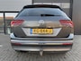 Volkswagen Tiguan 1.4 TSI ACT Highline 150PK ✓Rijklaar ✓Automaat ✓Full LED Adaptief ✓Panoramadak ✓Vol Leder ✓Navigatie ✓Camera ✓Climate ✓Cruise ✓Parkeersensoren ✓Lichtmetaal ✓Trekhaak