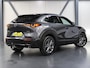 Mazda CX-30 186PK M Hybrid Luxury | 1ste eigenaar | AppleCarPlay/AndroidAuto | Armsteun | Head-Up Display | Navigatie | Stoel/StuurVerwarmd | Trekhaak | Camera | BOSE Sound | LEER | Dodehoekdetectie | Isofix | Privacy Glass | Electrische achterklep |