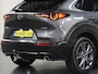 Mazda CX-30 186PK M Hybrid Luxury | 1ste eigenaar | AppleCarPlay/AndroidAuto | Armsteun | Head-Up Display | Navigatie | Stoel/StuurVerwarmd | Trekhaak | Camera | BOSE Sound | LEER | Dodehoekdetectie | Isofix | Privacy Glass | Electrische achterklep |