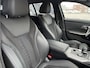 BMW 3-Serie Touring 330e M-Sport 292 pk Trekhaak Life Cockpit Adaptieve Cruise Camera Alcantara Parkeersensoren Stoelverwarming Stuurverwarming Sfeerverlichting Apple Carplay Android Auto DAB Plug In Hybride