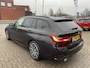 BMW 3-Serie Touring 330e M-Sport 292 pk Trekhaak Life Cockpit Adaptieve Cruise Camera Alcantara Parkeersensoren Stoelverwarming Stuurverwarming Sfeerverlichting Apple Carplay Android Auto DAB Plug In Hybride