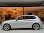 BMW 1-Serie 116i Executive Garantie Afn. Trekhaak StoelVW Navi Keyless Rijklaar