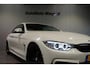 BMW 4-Serie 430i Coupé M-Sport/// | Trekhaak | H/K Sound | Head-Up Display | LED | PDC |