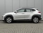 Hyundai Kona Electric EV Comfort 64 kWh / SOH 100% / Trekhaak 300KG / Navigatie / KRELL Audio / Adaptive Cruise Control / Climate Control / Achteruitrijcamera /