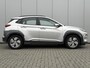 Hyundai Kona Electric EV Comfort 64 kWh / SOH 100% / Trekhaak 300KG / Navigatie / KRELL Audio / Adaptive Cruise Control / Climate Control / Achteruitrijcamera /
