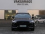 Volvo XC60 2.0 Recharge T8 AWD R-Design | Black Optic | Luchtvering | 360°-camera | Panoramadak | Trekhaak | Stuur-/Stoelverwarming | Apple-/Android Carplay | ACC | Dodehoek detectie | Contourstoelen