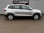 Skoda Karoq 1.0 TSI Ambition | Airco | Cruise control | Navigatie | Trekhaak | LM Velgen | PDC achter | Als Nieuw! | RIJKLAARPRIJS INCL 12 MAANDEN GARANTIE EN BEURT