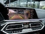 BMW X6 M50i High Executive | NL GELEVERDE AUTO | 1E EIGENAAR | 22 INCH | DRAVITGRAU | LASER | PANORAMA/SCHUIF-KANTELDAK | CARBON INTERIEURLIJSTEN | STOELVENTILATIE | INTEGRAL ACTIVE STEERING | TREKHAAK |