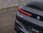 BMW X6 M50i High Executive | NL GELEVERDE AUTO | 1E EIGENAAR | 22 INCH | DRAVITGRAU | LASER | PANORAMA/SCHUIF-KANTELDAK | CARBON INTERIEURLIJSTEN | STOELVENTILATIE | INTEGRAL ACTIVE STEERING | TREKHAAK |