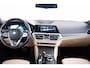 BMW 3-Serie 330e High Executive Luxury Line - Trekhaak - Panoramadak - Head up - Driving Assistant Professional - Stoelverwarming Voor/Achter - Elektrisch verstelbare stoelen - Getinte Ruiten - Comfort Access -