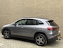 Mercedes-Benz EQA 300 4MATIC Business Solution AMG 67kWh | Navigatie | Sfeerverlichting | Camera | Cruise control | Lane assist | LED | DAB | Wegklapbare trekhaak | Virtual cockpit | Sportstoel&stuur | Stoelverwarming | Elektrische achterklep | Volledig onderhouden