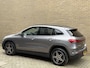 Mercedes-Benz EQA 300 4MATIC Business Solution AMG 67kWh | Navigatie | Sfeerverlichting | Camera | Cruise control | Lane assist | LED | DAB | Wegklapbare trekhaak | Virtual cockpit | Sportstoel&stuur | Stoelverwarming | Elektrische achterklep | Volledig onderhouden