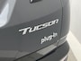 Hyundai Tucson 1.6 T-GDI PHEV Premium 4WD / Afneembare Trekhaak (1350kg) / Schuif- Kanteldak / Apple Carplay/Android Auto / Rondzichtcamera / Stoelverwarming / Stoelventilatie / Elektrisch Verstelbare Voorstoelen / Adaptieve Cruise Control /