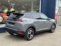 Peugeot 2008 1.2 Hybrid 145 PK GT | Automaat Hybride | Alcantara Bekleding | Stoelverwarming & Massage | Navigatie Via Telefoon | Parkeer Camera | Keyless Entry | Full LED Verlichting | Zwart Dak | Cruise Control Adaptief | Climate Control | Hoge Zitpositie.