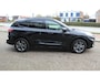 Ford Kuga 2.5-225pk Plug-in Hybrid ST-Line X. Hybride rijden voor een reële prijs ! Adaptive Cruise Control, Stoel- en voorraamverwarming, Climate Control, Metallic lak, Camera v+a, Elektr. achterklep, Side- en lane assist etc.