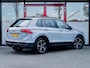 Volkswagen Tiguan 1.5 TSI Elegance | Trekhaak | 360 Camera | Schuif/ Kantel Panorama Dak | Stoelverwarming | Navigatie | Stuurwiel Verwarmd | Head-Up Display | All Season | Adaptieve Cruise Control | Climate Control |