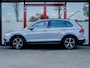 Volkswagen Tiguan 1.5 TSI Elegance | Trekhaak | 360 Camera | Schuif/ Kantel Panorama Dak | Stoelverwarming | Navigatie | Stuurwiel Verwarmd | Head-Up Display | All Season | Adaptieve Cruise Control | Climate Control |