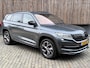 Skoda Kodiaq 1.5 TSI Sportline Automaat | Trekhaak uitklapbaar | Navigatiesysteem | Stoelverwarming | Stuurverwarming | Getint glas | Cruise control adaptief | Dodehoek detectie | Achteruitrijcamera | Parkeersensoren voor en achter