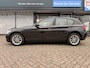 BMW 1-Serie 116i High Executive | Carplay | Automaat | Parkeersensoren
