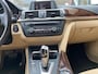 BMW 3-Serie 320i High Executive Upgrade stoelverwarming /Dakraam/weinig km