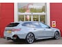 BMW 5-Serie Touring 520i M-SPORT | PANORAMA DAK | TREKHAAK ELEKTRISCH WEGKLAPBAAR | HARMAN KARDON AUDIO SYSTEM | SHADOW LINE PAKKET | ELEKTRISCH VERSTELBARE VOORSTOELEN MET GEHEUGENFUNCTIE | STOEL VENTILATIE VOOR | STOEL VERWARMING VOOR + ACHTER | 360° CAMERA | DRAADLOZE TELEFOONLADER | STAND VERWARMING | LEDEREN BEKLEDING "VEGANZA ZWART" | WARMTEWEREND GLAS | SPORT CHASSIS "M-TECHNIC" | INNOVATIE PAKKET: (HEAD UP DISPLAY/LIVE NAVIGATIE/INTERIEUR CAMERA/PARKEERSENSOREN VOOR+ACHTER/CONNECTED SERVICES) | DRAADLOZE APPLE CARPLAY/ANDROID AUTO | TRAVEL PAKKET (ELEKTRISCH BEDIENBARE ACHTERKLEP/COMFORT ACCESS/TOEGANG VIA SMARTPHONE) | DODEHOEK DETECTIE | ELEKTRISCH BEDIENBAAR STUURKOLOM |