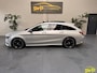 Mercedes-Benz CLA Shooting Brake 180 | AMG | MAGNO-ZILVER | Pano | Navi | Dodehoek | Memory | Elektr Stoel | Multispaak | Elektr klep