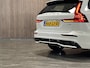 Volvo V60 2.0 T6 Plug-in hybrid AWD Plus Dark | Trekhaak | 455pk | Adaptieve Cruise Control | Stoel en Stuurwielverwarming | Parkeercamera | Full LED Meesturende koplampen | Pilot Assist | BLIS Dode Hoek Detectie | Elektrische voorstoelen geheugen | Leder Alcantara R-Design Contour stoelen wit stiksel met bies | Zitting verlenging voorstoelen | Lederen dashboard | 20 Inch | Keyless Drive | Parkeersensoren voor+achter | Elektrisch bedienbare achterklep | Geïntegreerde zongordijnen achterportieren | Verlichte instaplijsten | 7-Persoons | 4-Zone Climate Control | DAB Radio | Apple Carplay/Android Auto | Volvo On Call met mobiele App functie | Onyx Black Metallic |