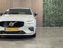 Volvo V60 2.0 T6 Plug-in hybrid AWD Plus Dark | Trekhaak | 455pk | Adaptieve Cruise Control | Stoel en Stuurwielverwarming | Parkeercamera | Full LED Meesturende koplampen | Pilot Assist | BLIS Dode Hoek Detectie | Elektrische voorstoelen geheugen | Leder Alcantara R-Design Contour stoelen wit stiksel met bies | Zitting verlenging voorstoelen | Lederen dashboard | 20 Inch | Keyless Drive | Parkeersensoren voor+achter | Elektrisch bedienbare achterklep | Geïntegreerde zongordijnen achterportieren | Verlichte instaplijsten | 7-Persoons | 4-Zone Climate Control | DAB Radio | Apple Carplay/Android Auto | Volvo On Call met mobiele App functie | Onyx Black Metallic |