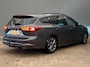Ford Focus Wagon wagon 1.0 EcoBoost Hybrid ST Line | Trekhaak | Stoel/stuur/voorruit verwarming | Cruise adaptief | Dodehoek detectie | Camera | Apple Carplay/Android Auto | Achteruitrijcamera | Apple Carplay/Android Auto|telefoonintegratie premium | Cruise control adaptief met Stop&Go en stuurhulp
