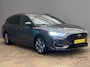 Ford Focus Wagon wagon 1.0 EcoBoost Hybrid ST Line | Trekhaak | Stoel/stuur/voorruit verwarming | Cruise adaptief | Dodehoek detectie | Camera | Apple Carplay/Android Auto | Achteruitrijcamera | Apple Carplay/Android Auto|telefoonintegratie premium | Cruise control adaptief met Stop&Go en stuurhulp